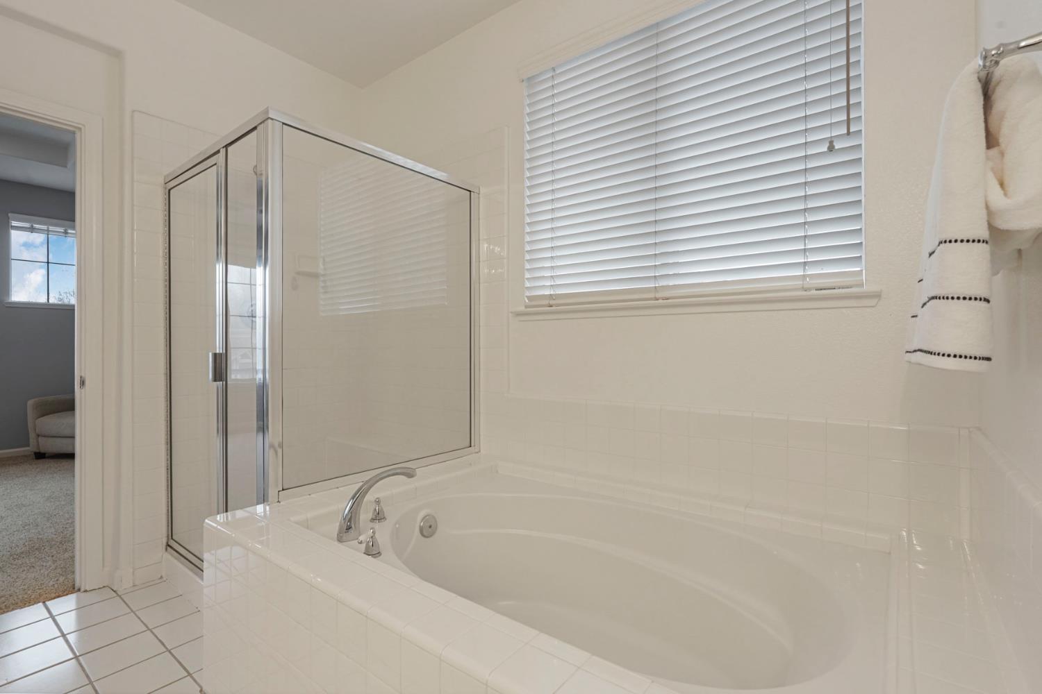 732 Pradera Way San Ramon, CA 94583 - Photo 33 of 45 a bathroom with a bathtub and a shower