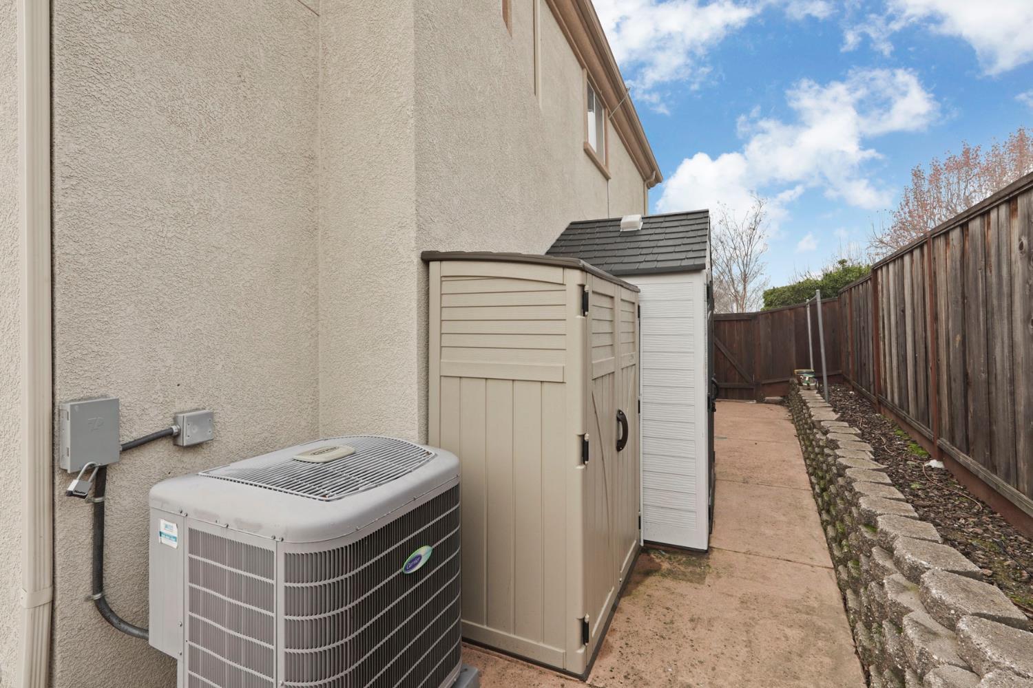 732 Pradera Way San Ramon, CA 94583 - Photo 35 of 45 a bathroom with a granite countertop sink and washing machine