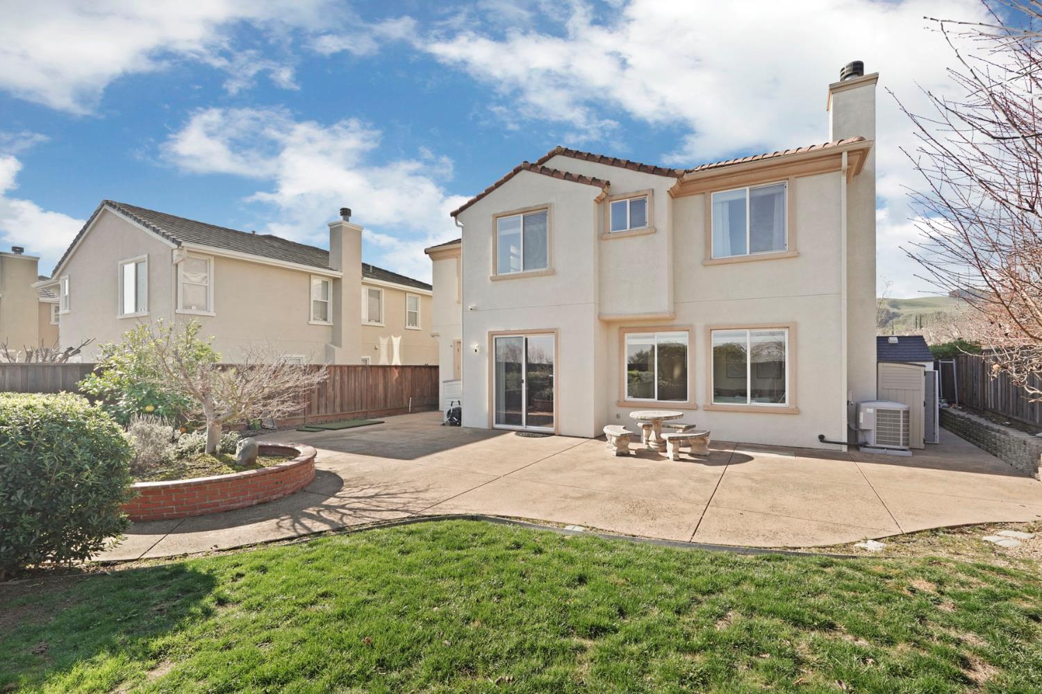 732 Pradera Way San Ramon, CA 94583 - Photo 37 of 45 a front view of a house with a yard and garage