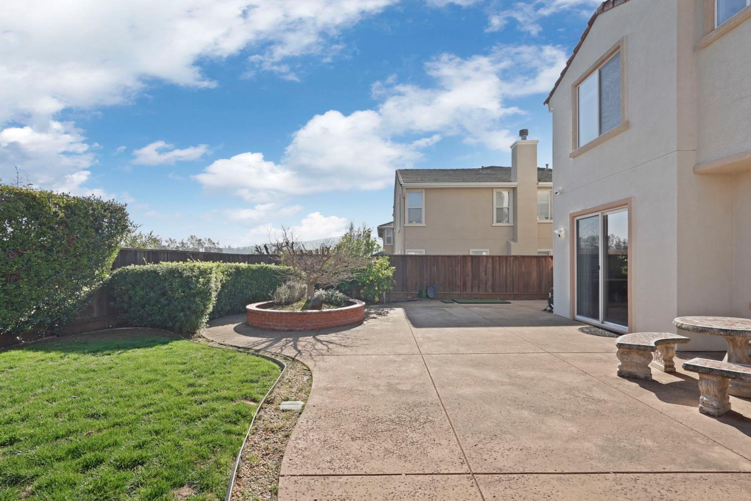 732 Pradera Way San Ramon, CA 94583 - Photo 42 of 45 a view of a backyard with sitting area and garden