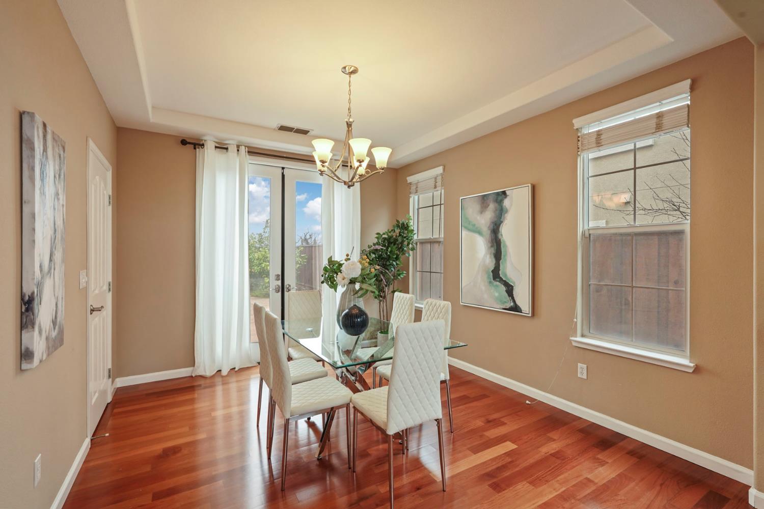 732 Pradera Way San Ramon, CA 94583 - Photo 8 of 45 a view of a dining room with furniture window and wooden floor
