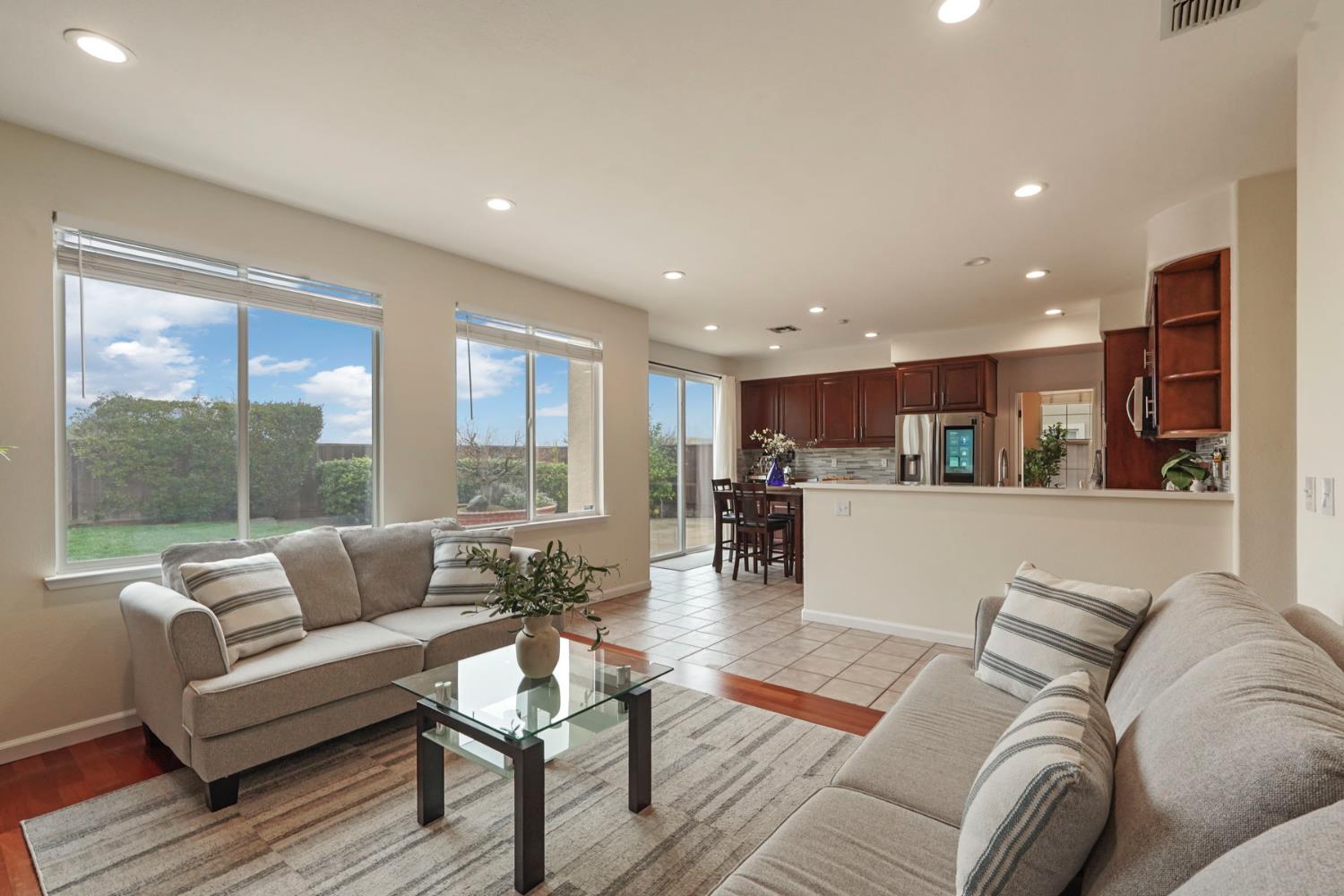 732 Pradera Way San Ramon, CA 94583 - Photo 10 of 45 a living room with furniture and a large window