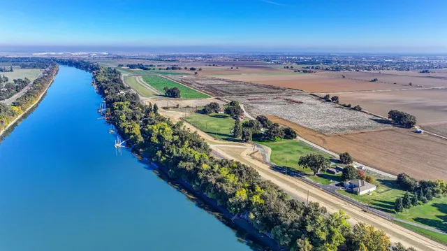 an aerial view of beach and ocean