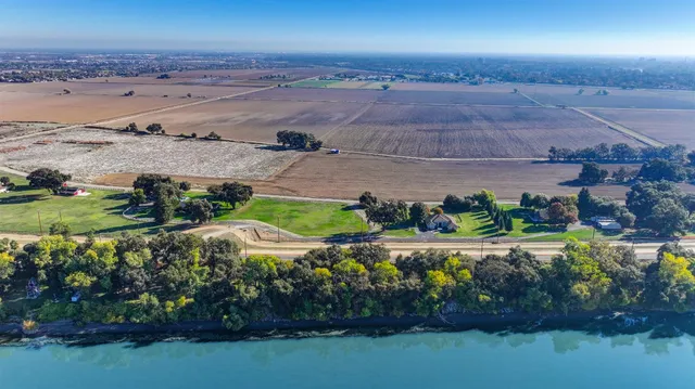 an aerial view of a house with a garden