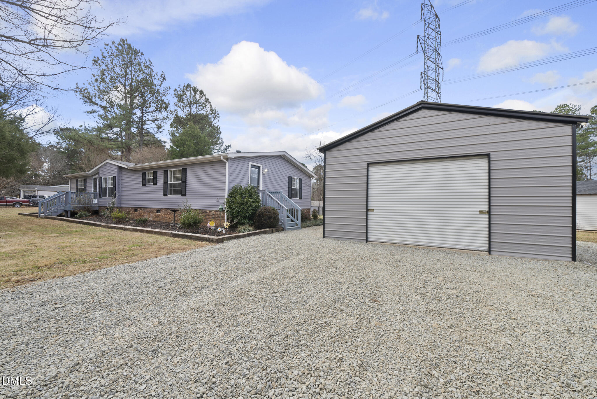 4703 Trinity Lane Rougemont, NC 27572 - Photo 5 of 7 a house view with a outdoor space