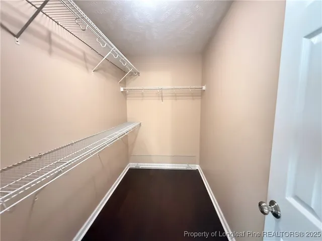 a room with a bed and a window