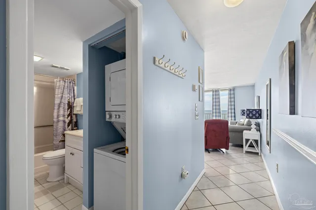 a bathroom with a sink mirror and toilet