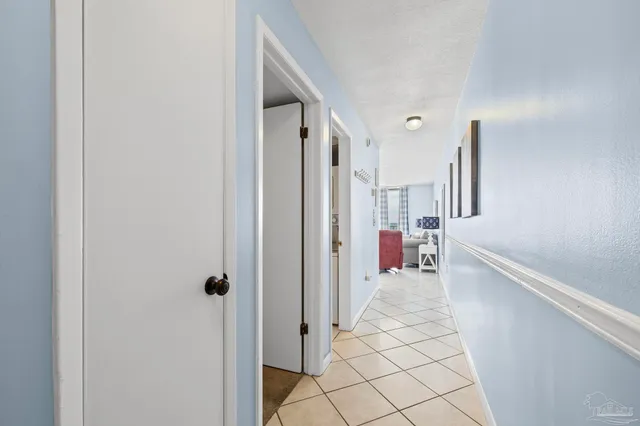 a view of swimming pool with outdoor seating and barbeque oven