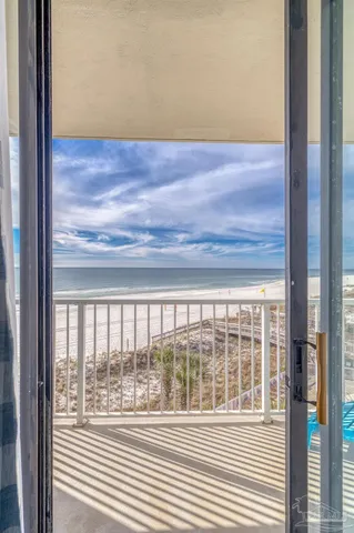 a view of a hallway with entryway