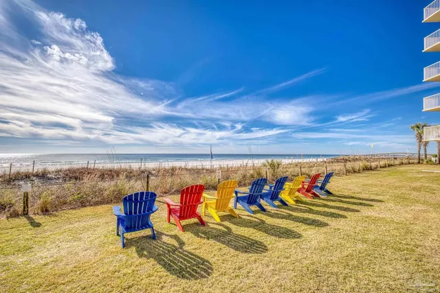 a view of balcony with furniture
