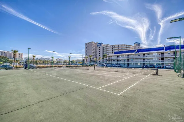 a view of a balcony with an ocean view
