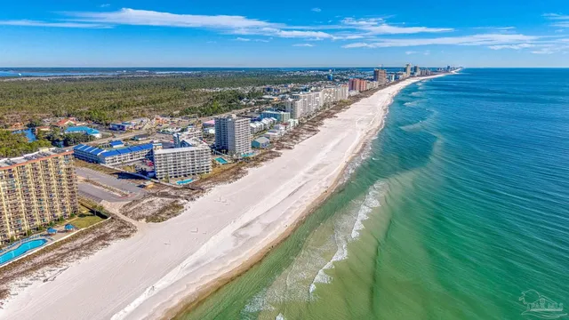 a view of a livingroom with furniture and a flat screen tv