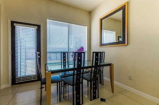 a view of a livingroom with furniture and wooden floor