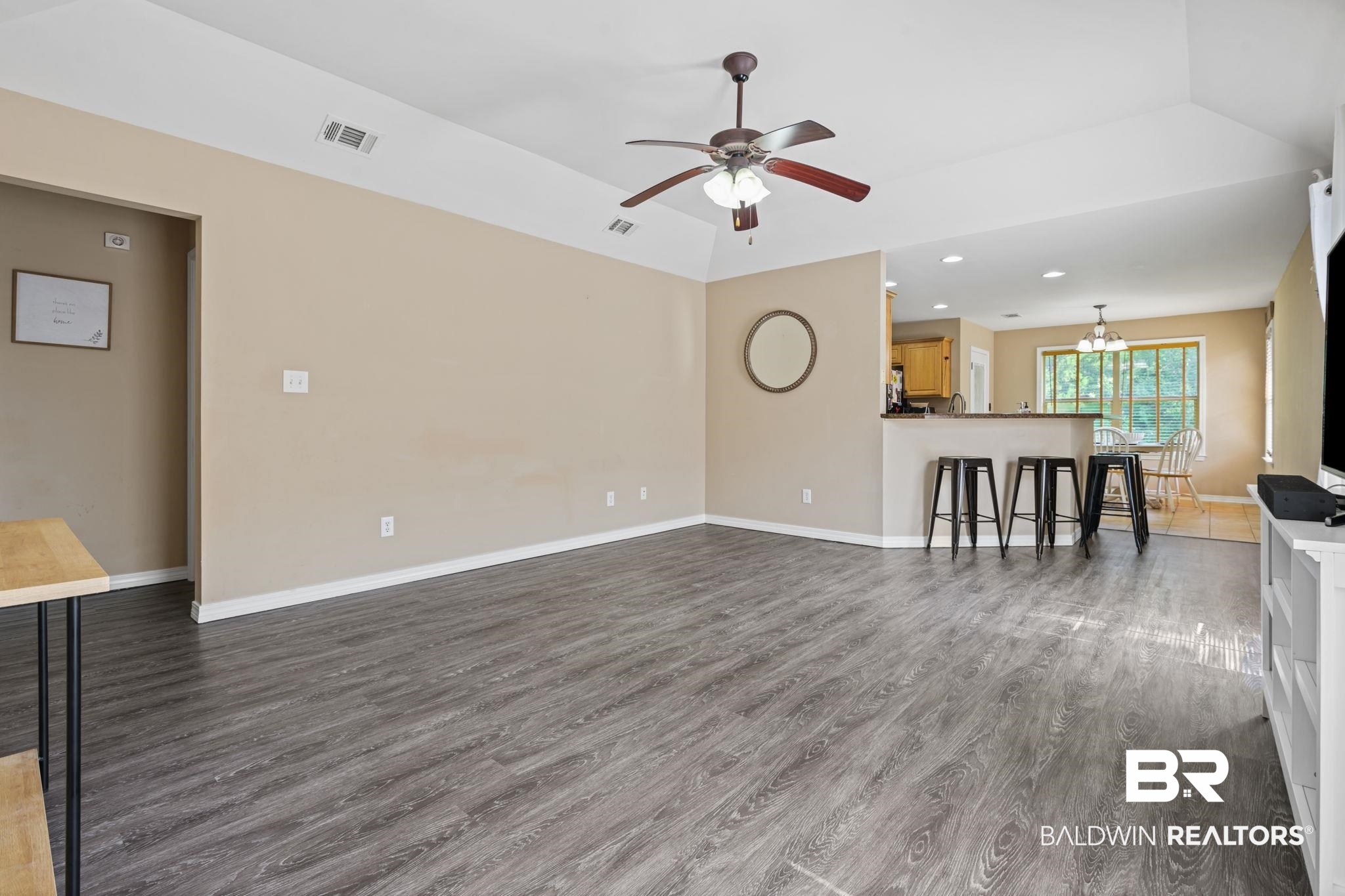 8956 Spring Grove North Mobile, AL 36695 - Photo 2 of 19 Unfurnished living room featuring wood finished floors, ceiling fan, baseboards, and recessed lighting