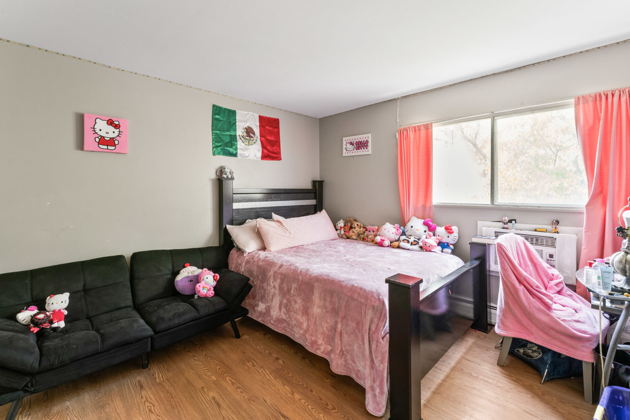 2504 West Algonquin Road, Unit 17 Rolling Meadows, IL 60008 - Photo 12 of 21 a bedroom with a bed and a window