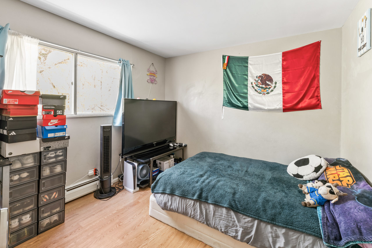 2504 West Algonquin Road, Unit 17 Rolling Meadows, IL 60008 - Photo 14 of 21 a bedroom with a bed and flat screen tv