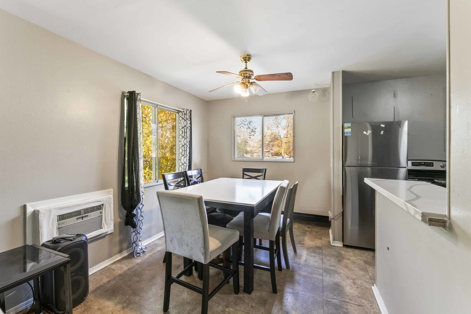 2504 West Algonquin Road, Unit 17 Rolling Meadows, IL 60008 - Photo 6 of 21 a view of a dining room with furniture and a chandelier