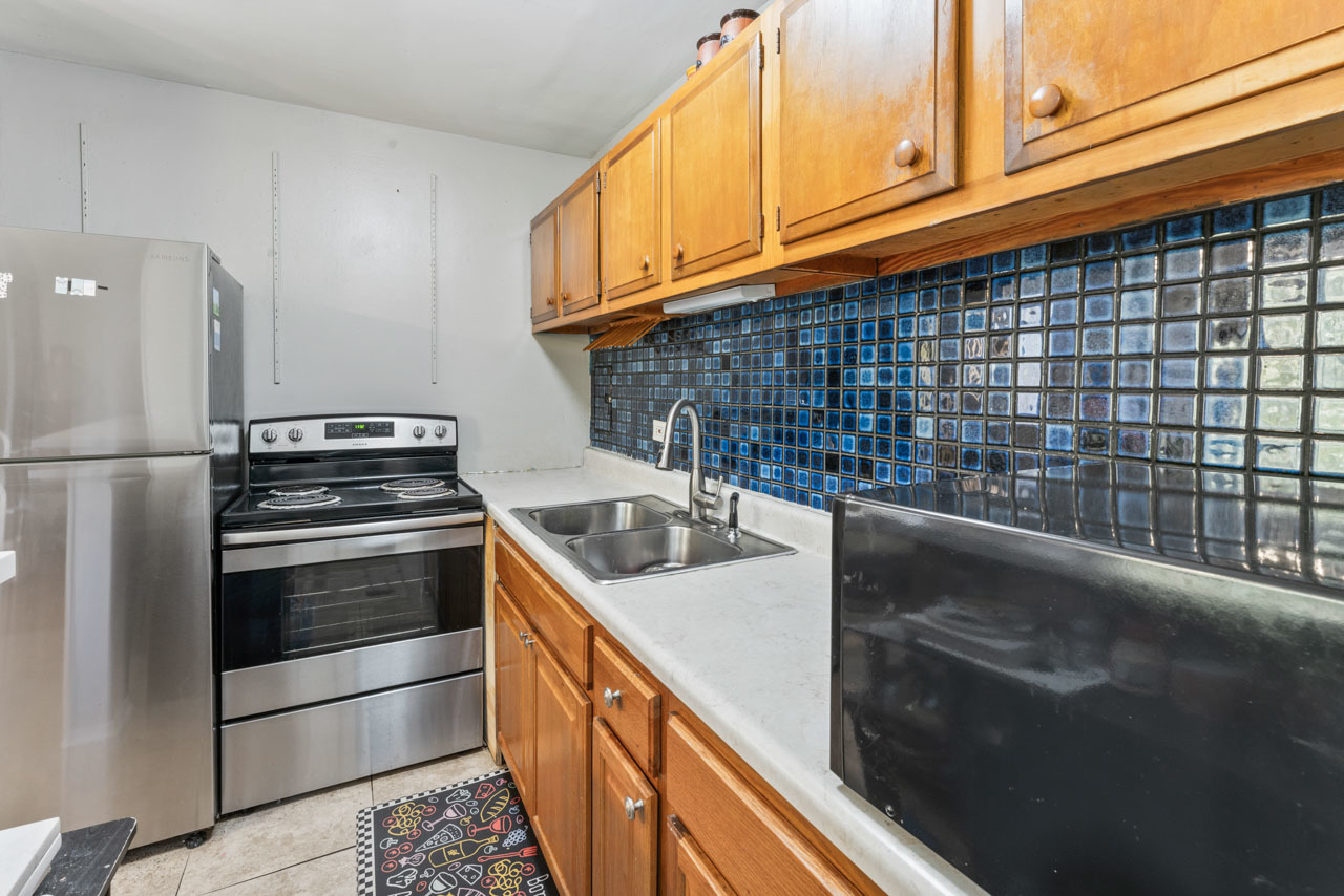 2504 West Algonquin Road, Unit 17 Rolling Meadows, IL 60008 - Photo 10 of 21 a kitchen with stainless steel appliances granite countertop a sink and a stove