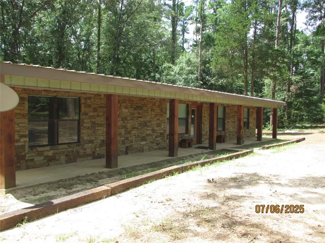 a view of backyard with green space