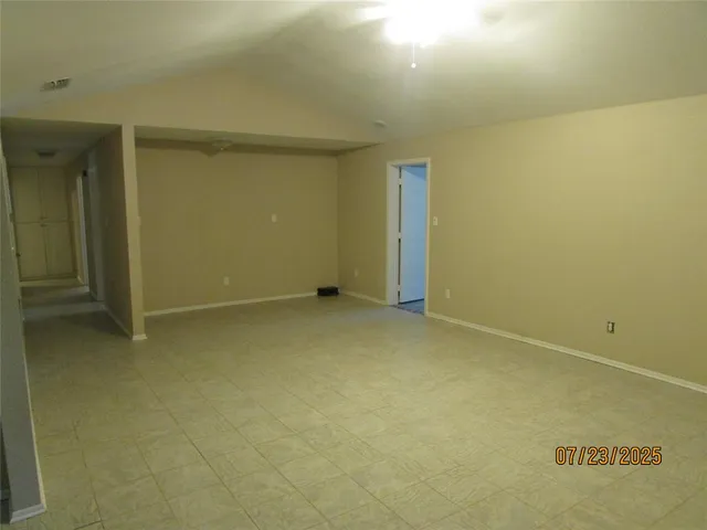 a bathroom with a sink vanity granite and a mirror