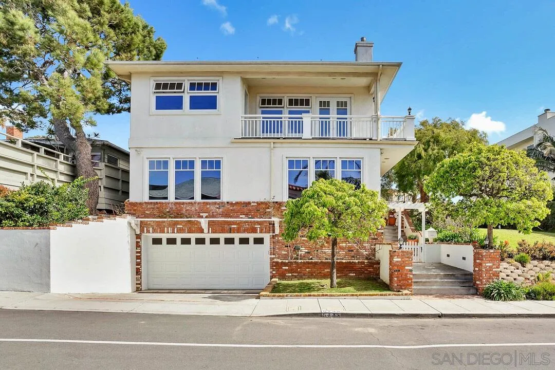 5735 Dolphin Place La Jolla, CA 92037 - Photo 1 of 75 a view of a house with a garden and plants