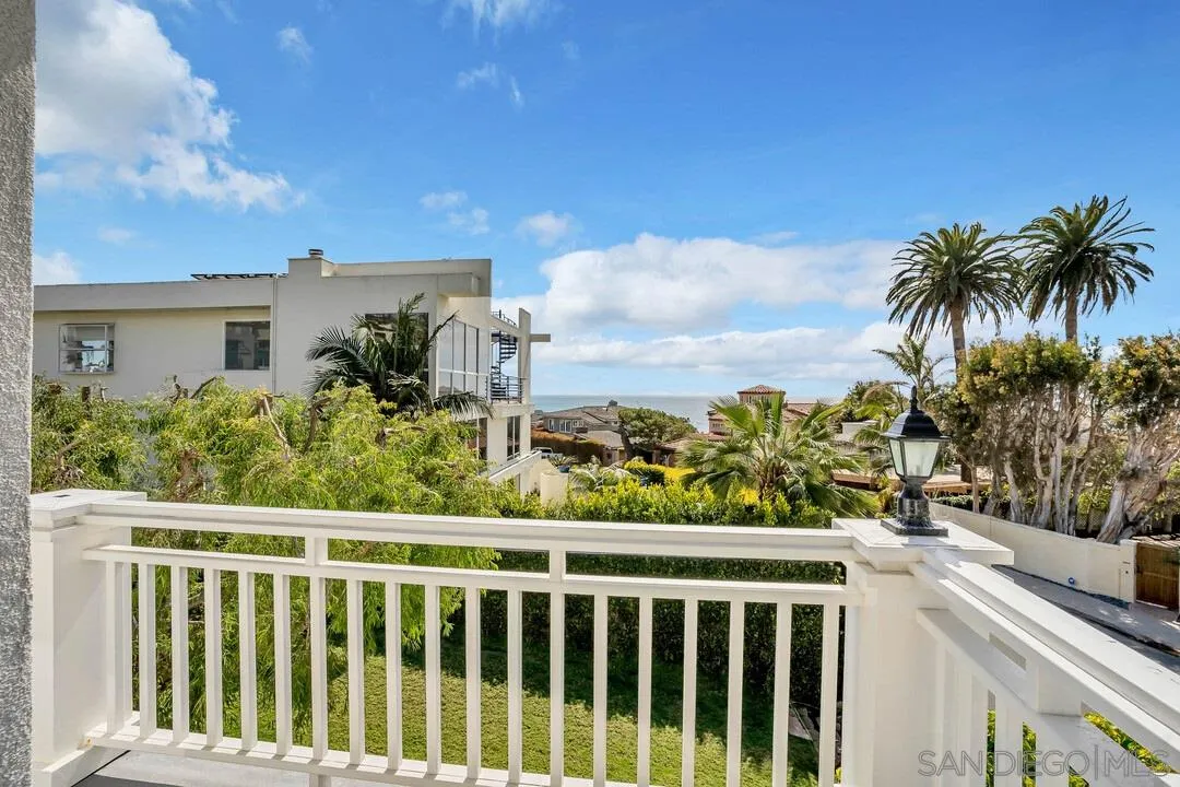 5735 Dolphin Place La Jolla, CA 92037 - Photo 30 of 75 a view of a balcony with wooden fence