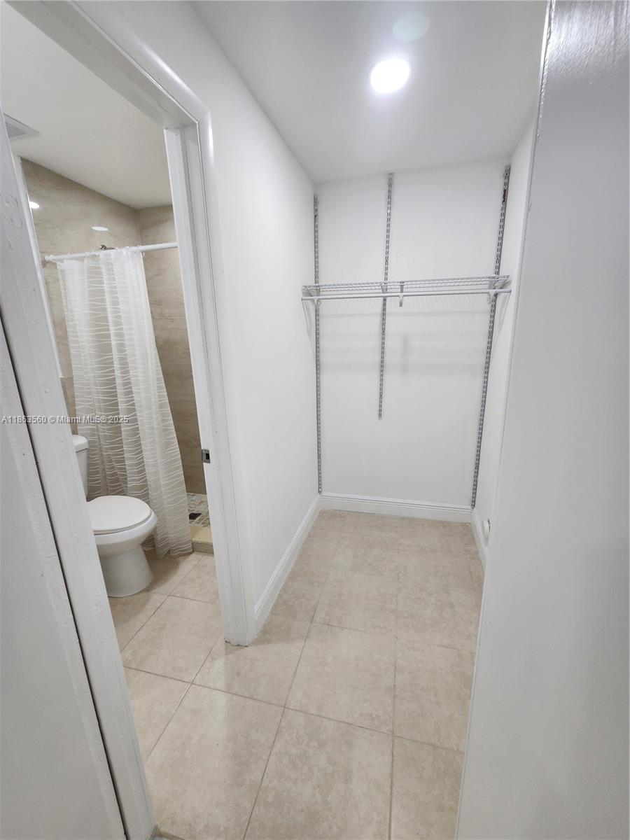 645 Northwest 7th Avenue, Unit STUDIO Homestead, FL 33030 - Photo 3 of 7 a view of a bathroom with a sink and a vanity