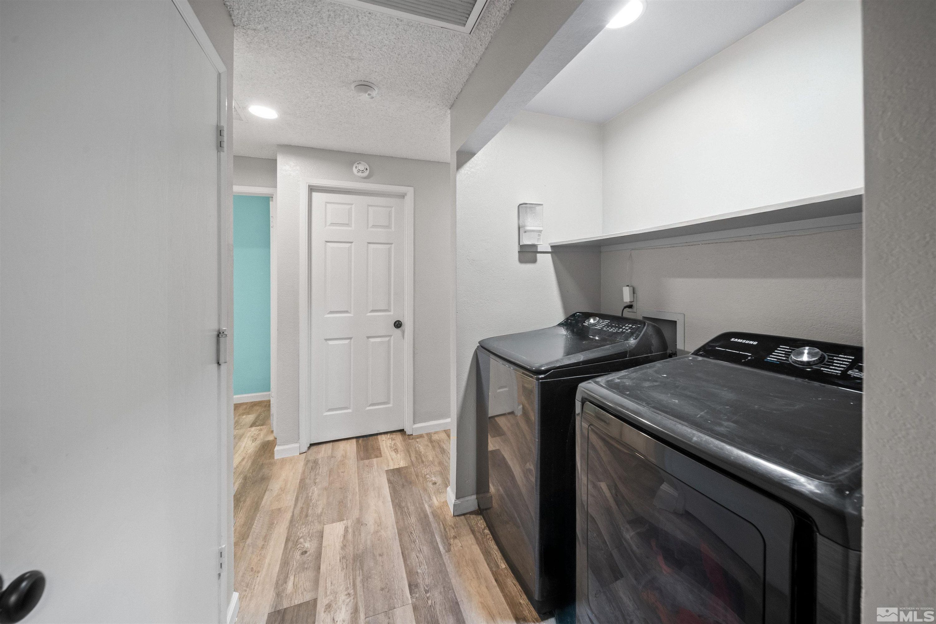 565 Spruce Drive Fernley, NV 89408 - Photo 15 of 19 a room that has a washer and dryer