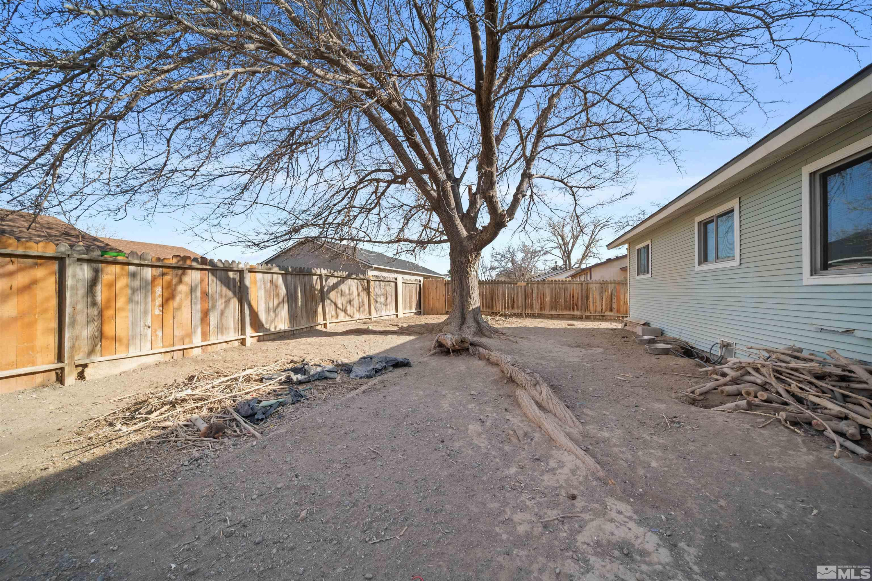 565 Spruce Drive Fernley, NV 89408 - Photo 17 of 19 a view of a house with a snow on the road