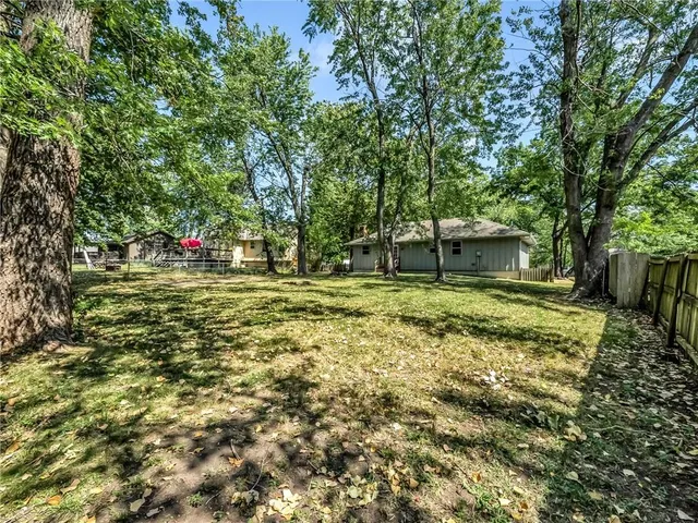 $320,000 | 1300 Northeast Browning Lane, Lee's Summit, MO 64086