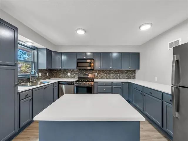 $320,000 | 1300 Northeast Browning Lane, Lee's Summit, MO 64086