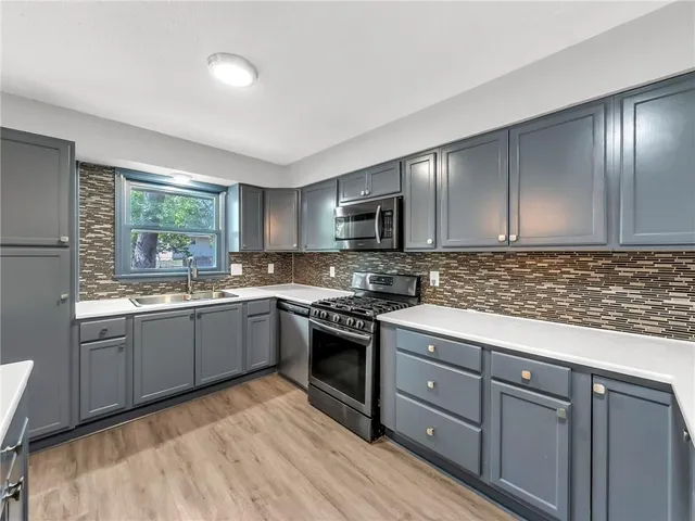 $320,000 | 1300 Northeast Browning Lane, Lee's Summit, MO 64086