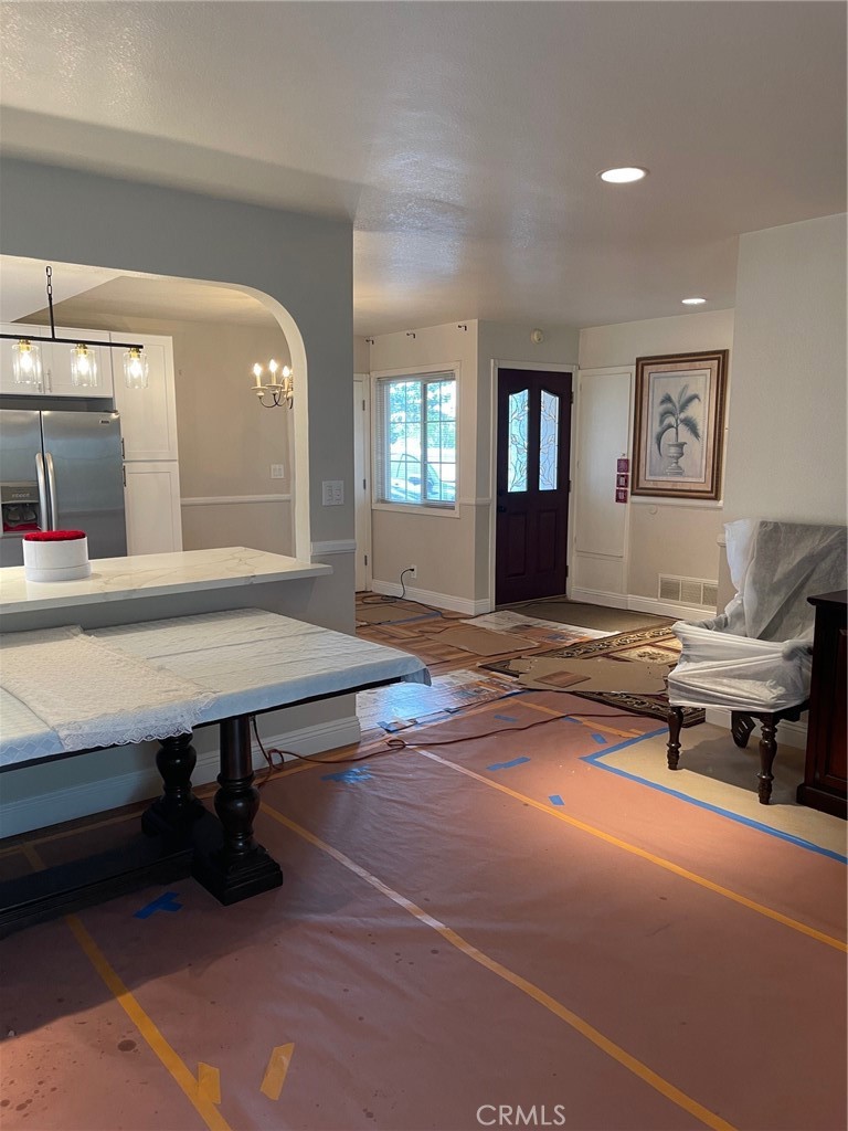 6250 Filkins Avenue Rancho Cucamonga, CA 91737 - Photo 15 of 48 a living room with furniture pool table and a window