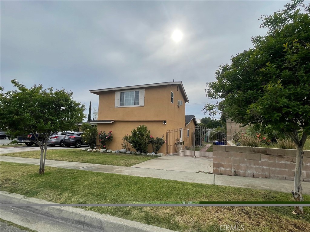 6250 Filkins Avenue Rancho Cucamonga, CA 91737 - Photo 2 of 48 a view of a house with a yard