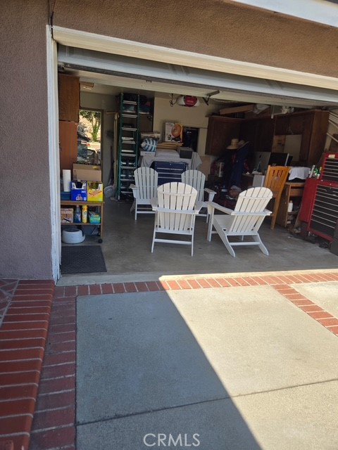 6250 Filkins Avenue Rancho Cucamonga, CA 91737 - Photo 36 of 48 a view of a patio with table and chairs