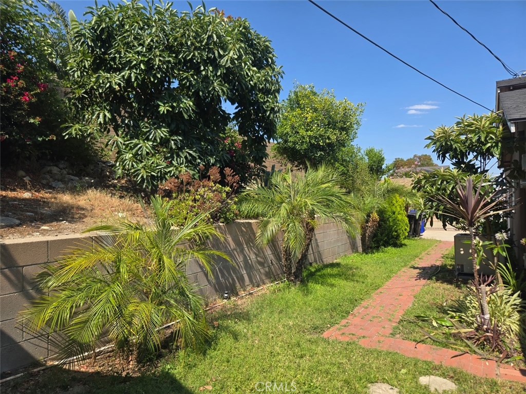 6250 Filkins Avenue Rancho Cucamonga, CA 91737 - Photo 40 of 48 a view of a yard with plants