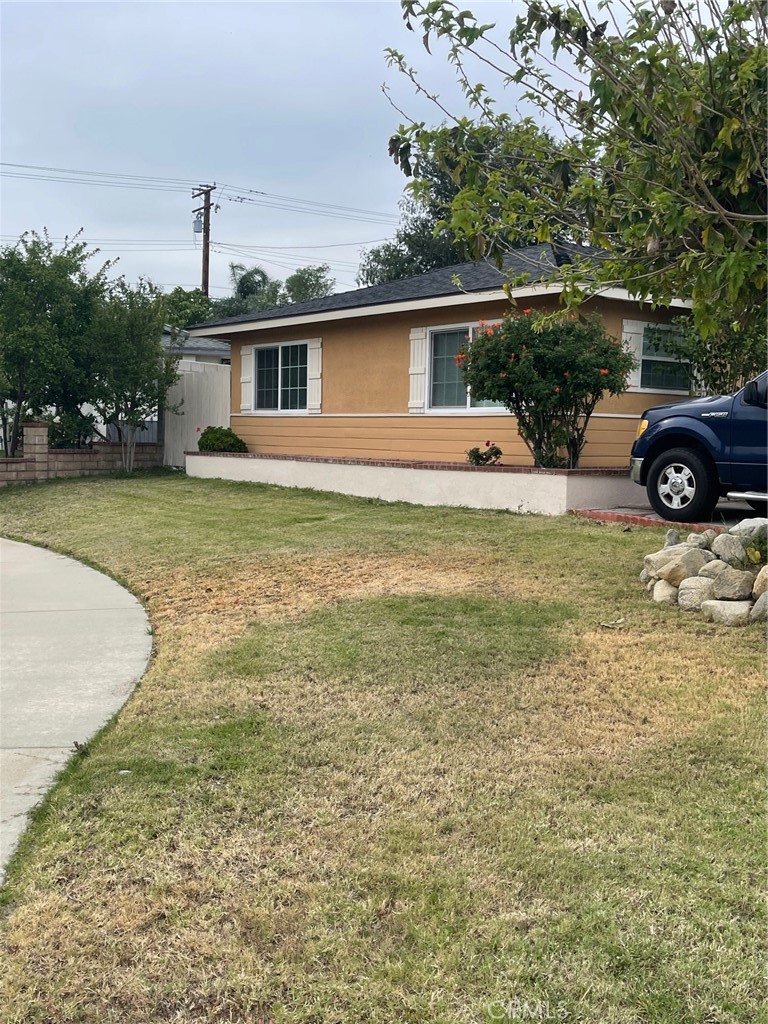 6250 Filkins Avenue Rancho Cucamonga, CA 91737 - Photo 6 of 48 a view of a house with a swimming pool