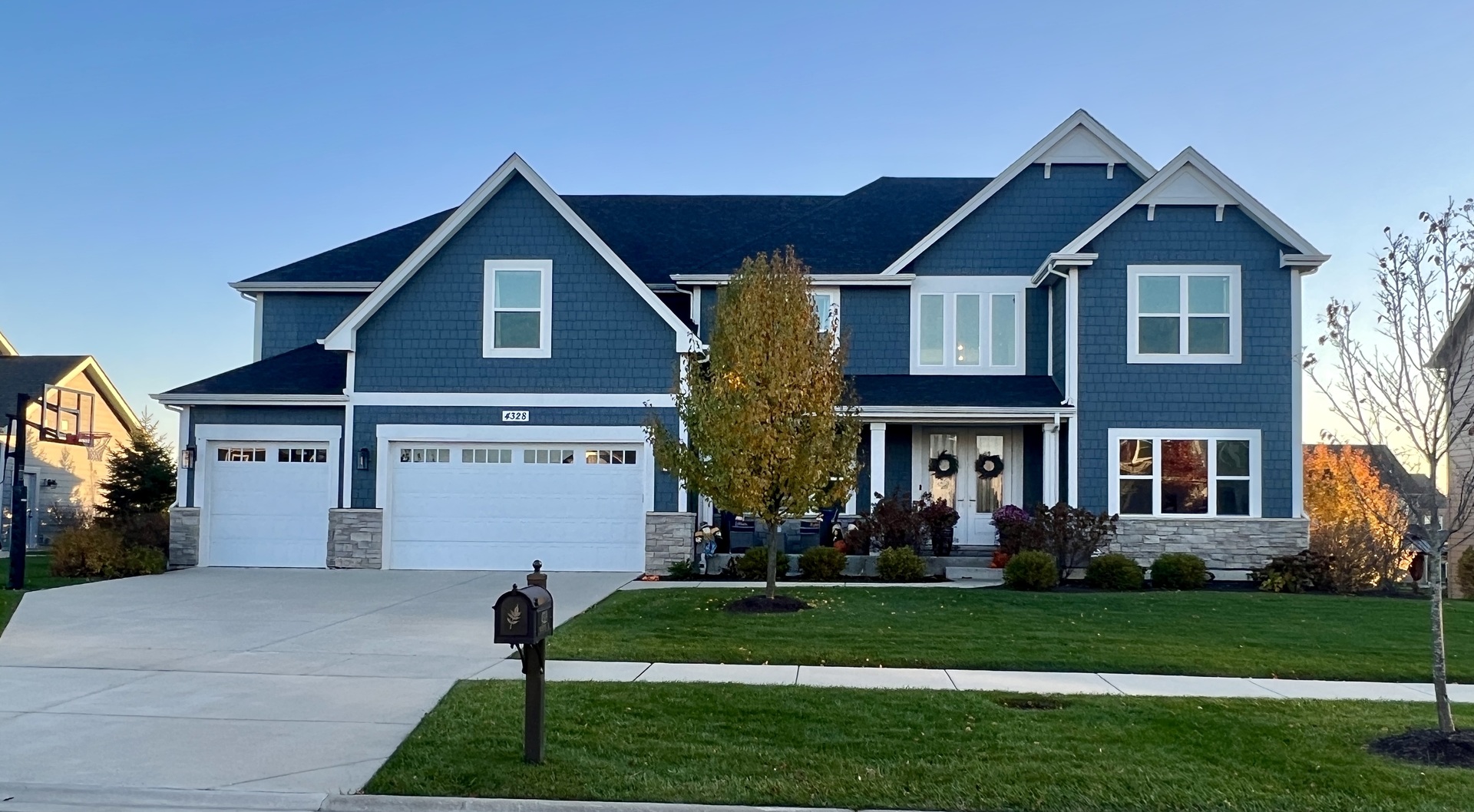 4328 Carpenter Road Naperville, IL 60564 - Photo 1 of 1 a front view of a house with a yard