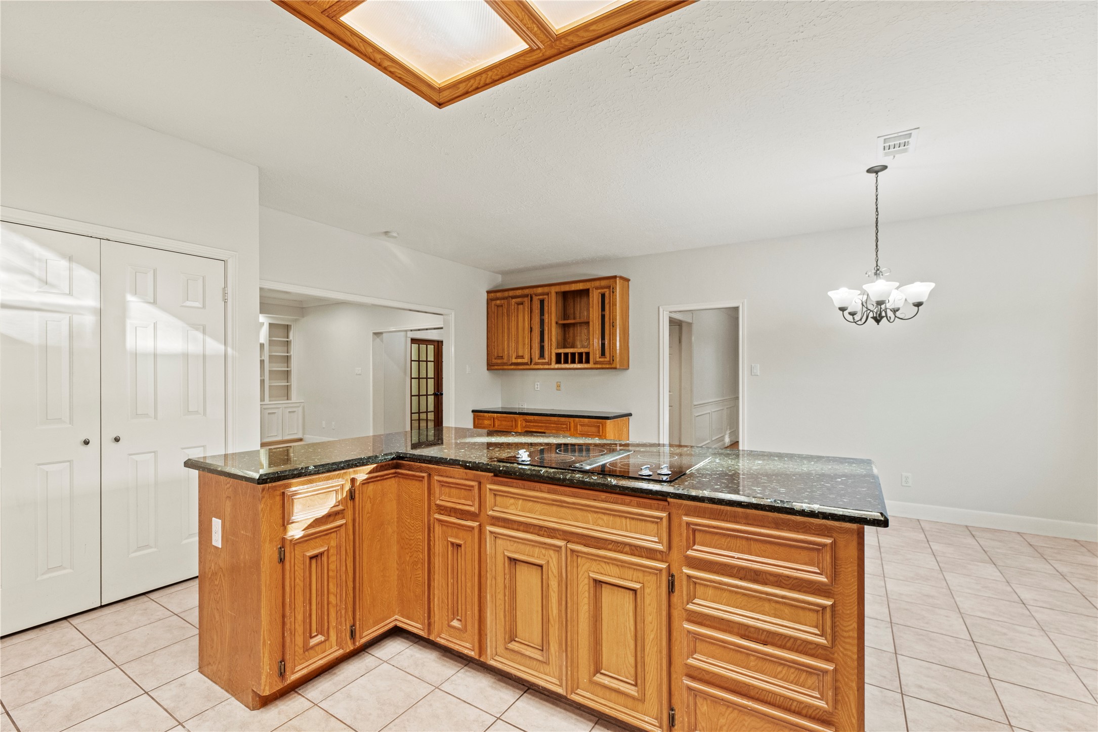 12502 Pavilion Court Tomball, TX 77377 - Photo 12 of 37 a kitchen with stainless steel appliances granite countertop a sink and a counter space