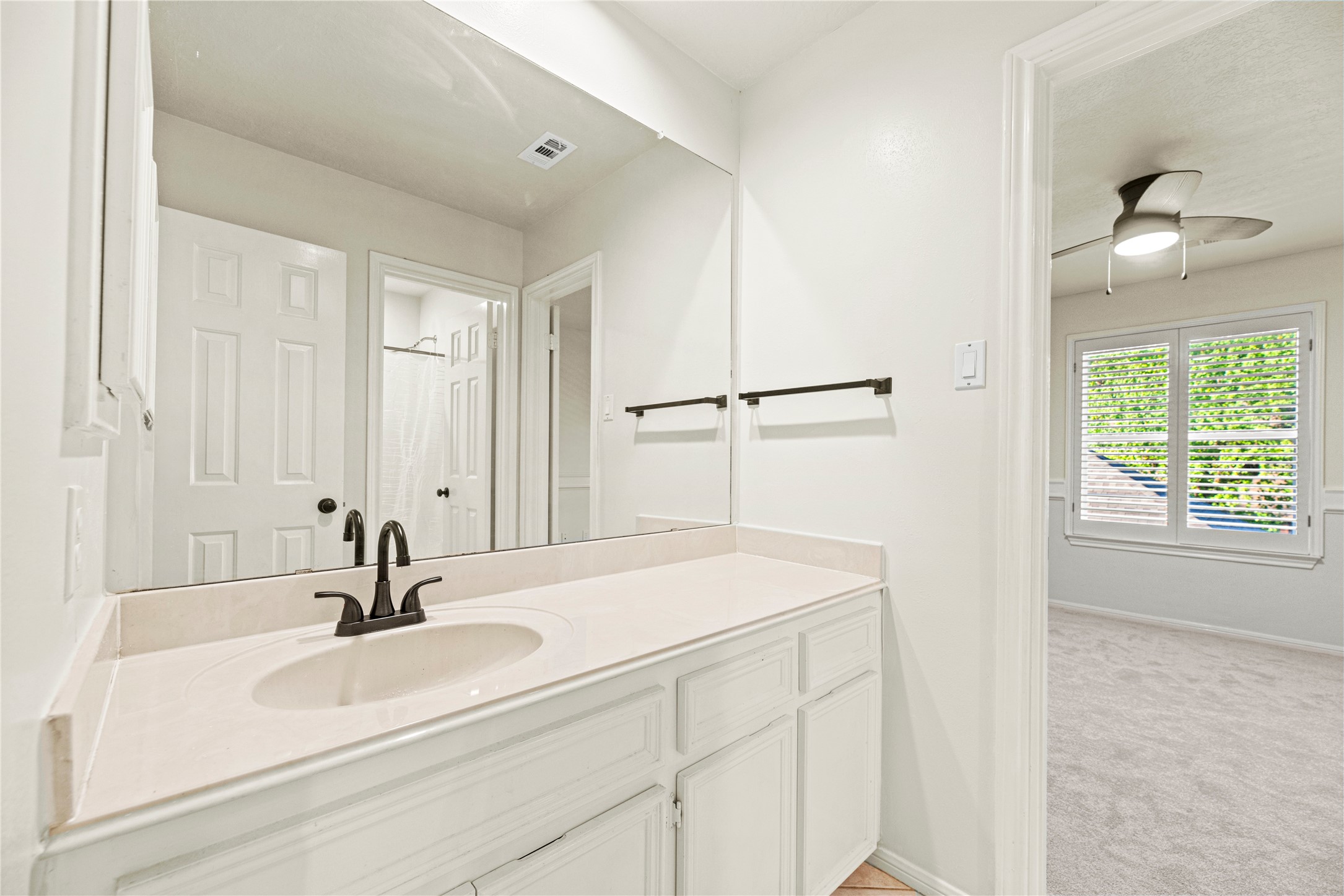 12502 Pavilion Court Tomball, TX 77377 - Photo 30 of 37 a bathroom with a sink and a mirror