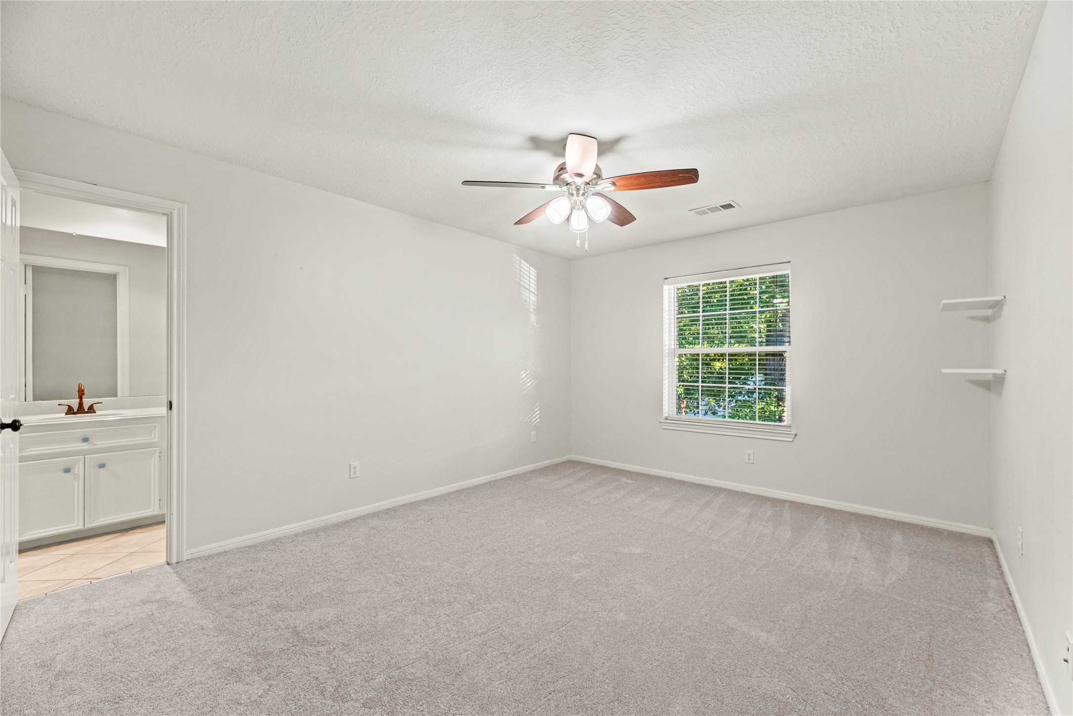12502 Pavilion Court Tomball, TX 77377 - Photo 34 of 37 wooden floor in an empty room with a window