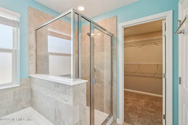 a view of a playground with basketball court