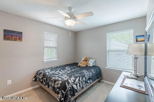 404 Hepburn Road Orange Park, FL 32065 - Photo 22 of 31 a bedroom with a bed and window