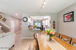 404 Hepburn Road Orange Park, FL 32065 - Photo 5 of 31 a living room with furniture and a large window