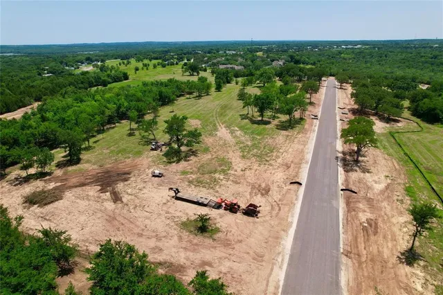 a view of a garden with a lake