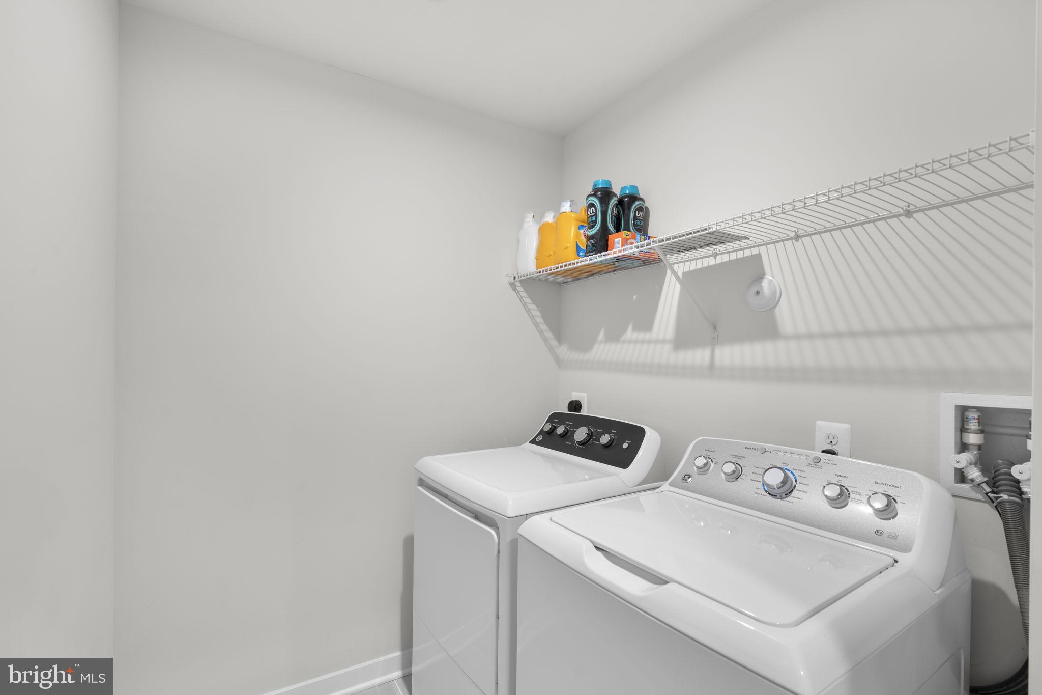 1713 Aurora Way Frederick, MD 21702 - Photo 44 of 57 a utility room with dryer and washer
