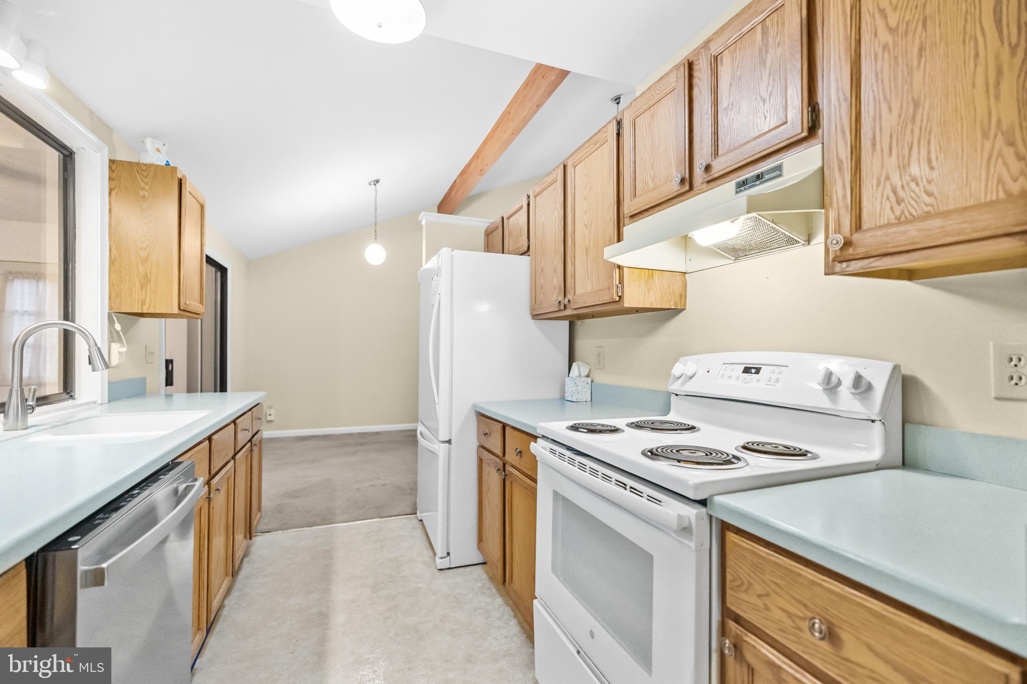 124 Saylers Creek Road Locust Grove, VA 22508 - Photo 11 of 55 a kitchen with stainless steel appliances granite countertop a sink stove and cabinets