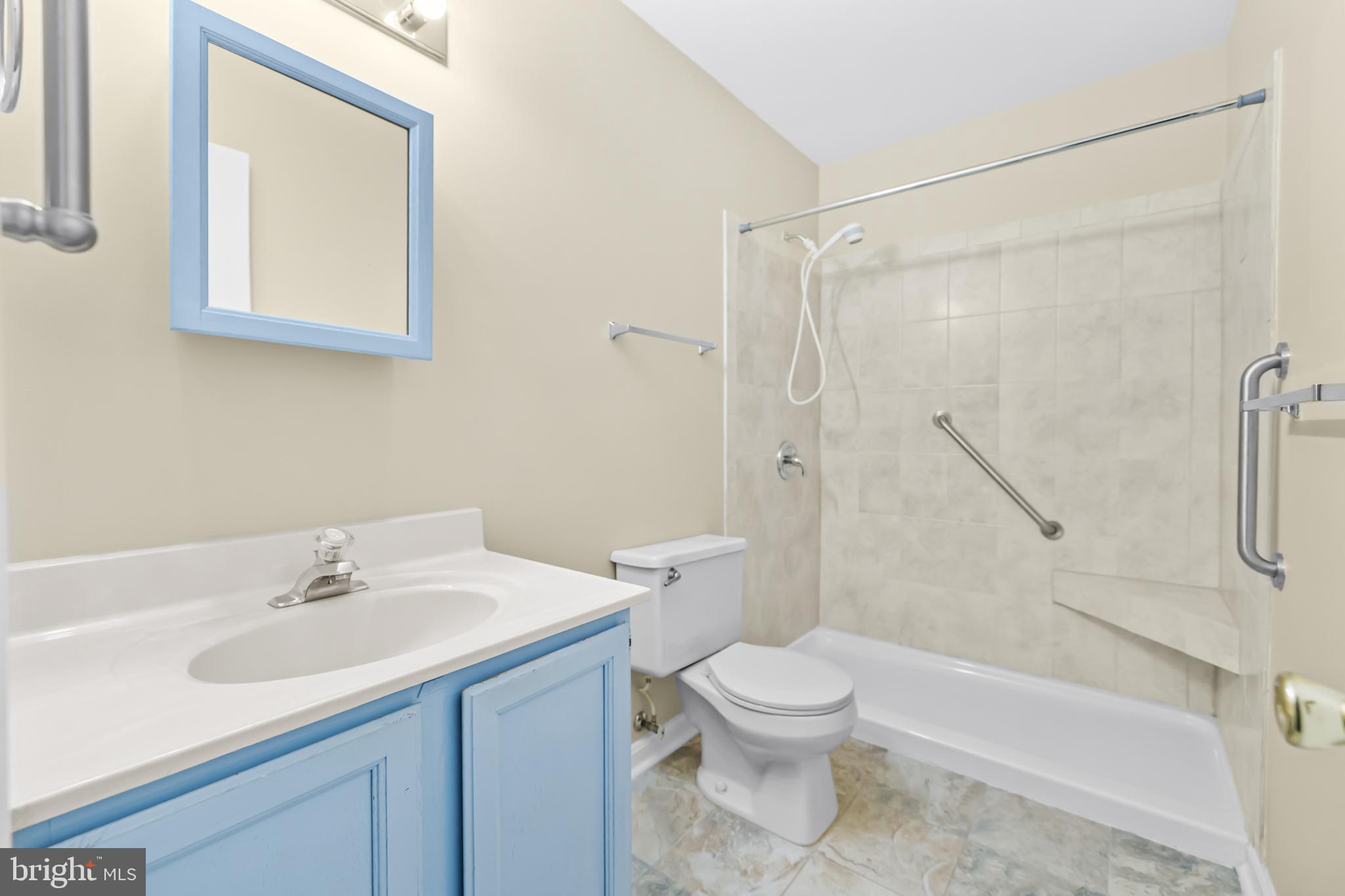 124 Saylers Creek Road Locust Grove, VA 22508 - Photo 19 of 55 a bathroom with a sink toilet and shower