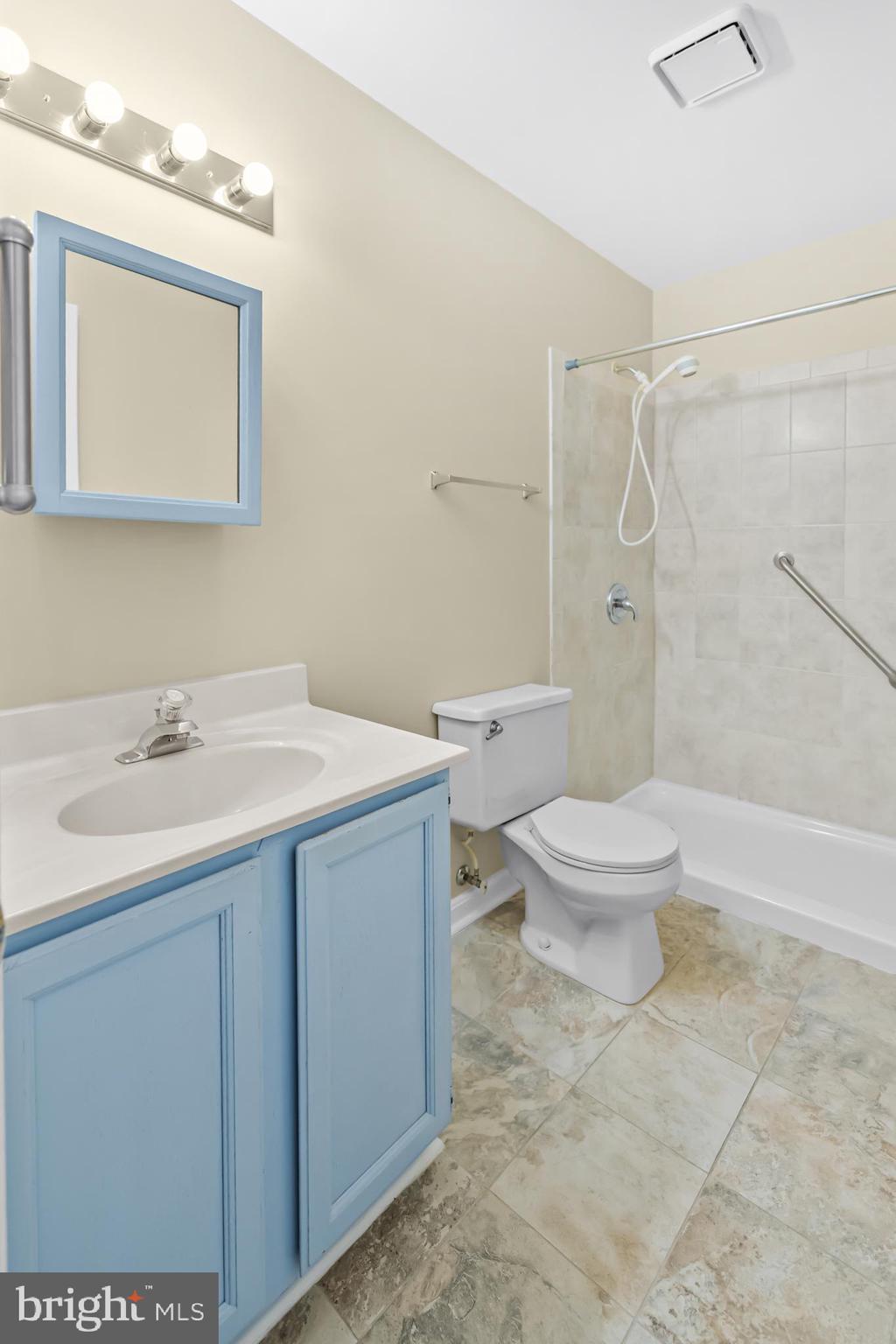 124 Saylers Creek Road Locust Grove, VA 22508 - Photo 20 of 55 a bathroom with a toilet sink and mirror