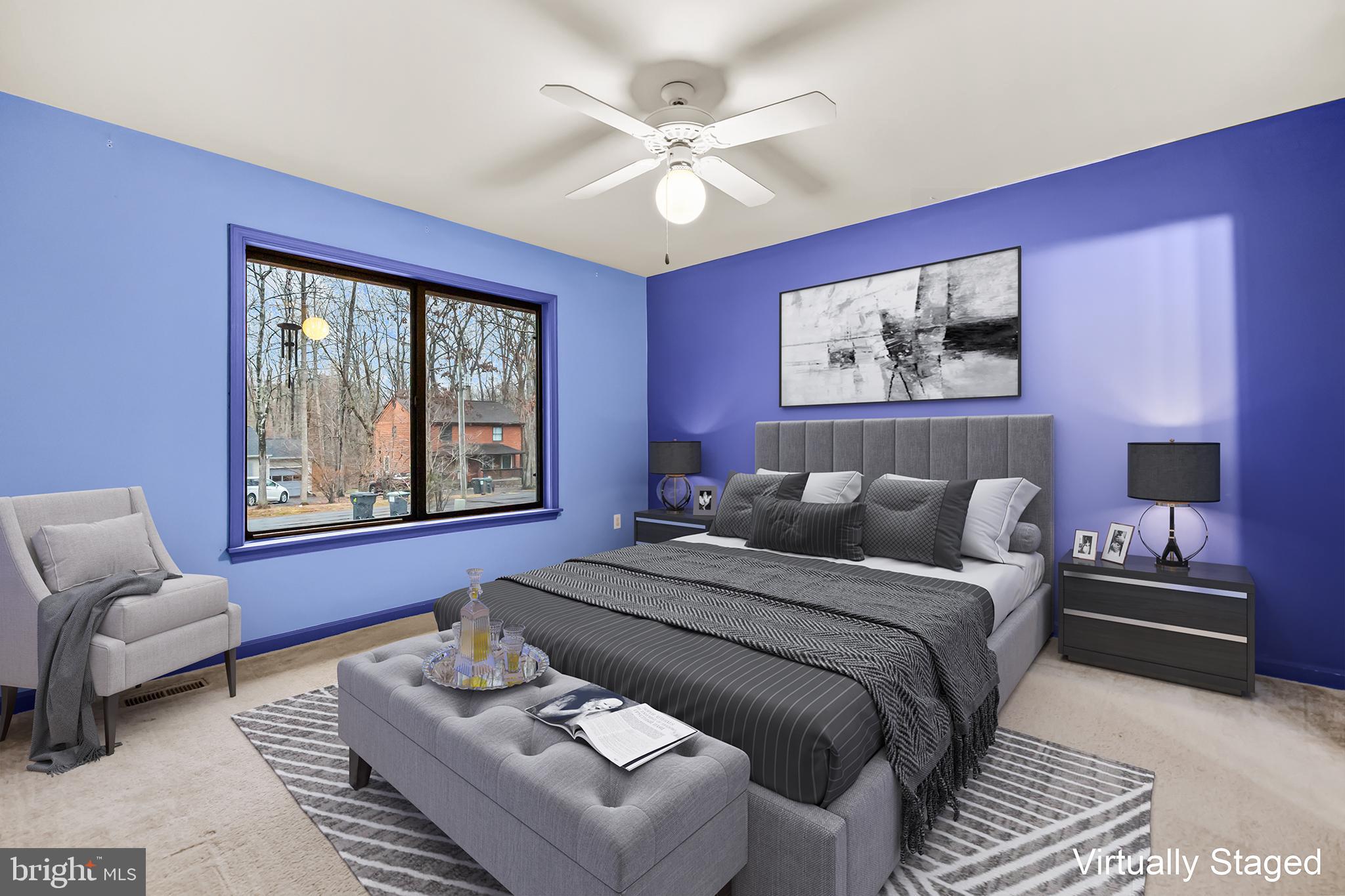 124 Saylers Creek Road Locust Grove, VA 22508 - Photo 24 of 55 a bed room with a bed and a couch